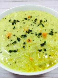 coconut mulligatawny soup in white bowl