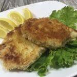 Pork Schnitzel on Lettuce with lemons