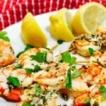 Shrimp Scampi Skewers on a white plate