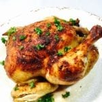 Roast chicken on a white plate