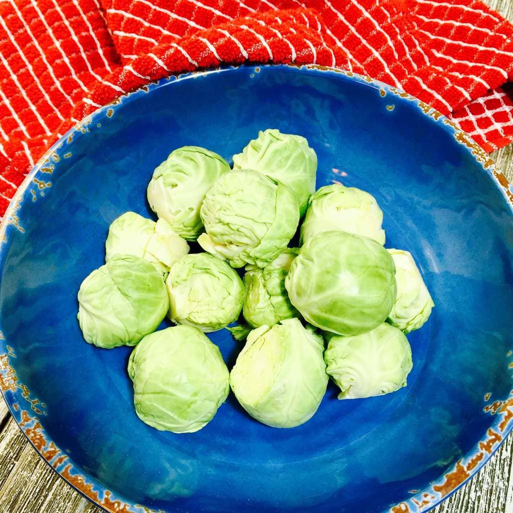 Brussels Sprouts in a blue bowl