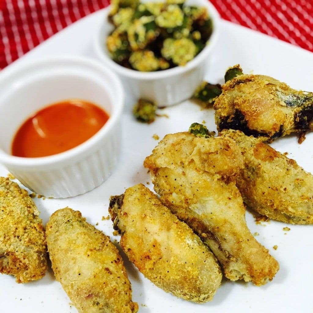 crispy chicken wings on a white plate