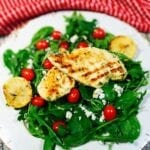 Grilled Lemon Chicken Salad on a white plate