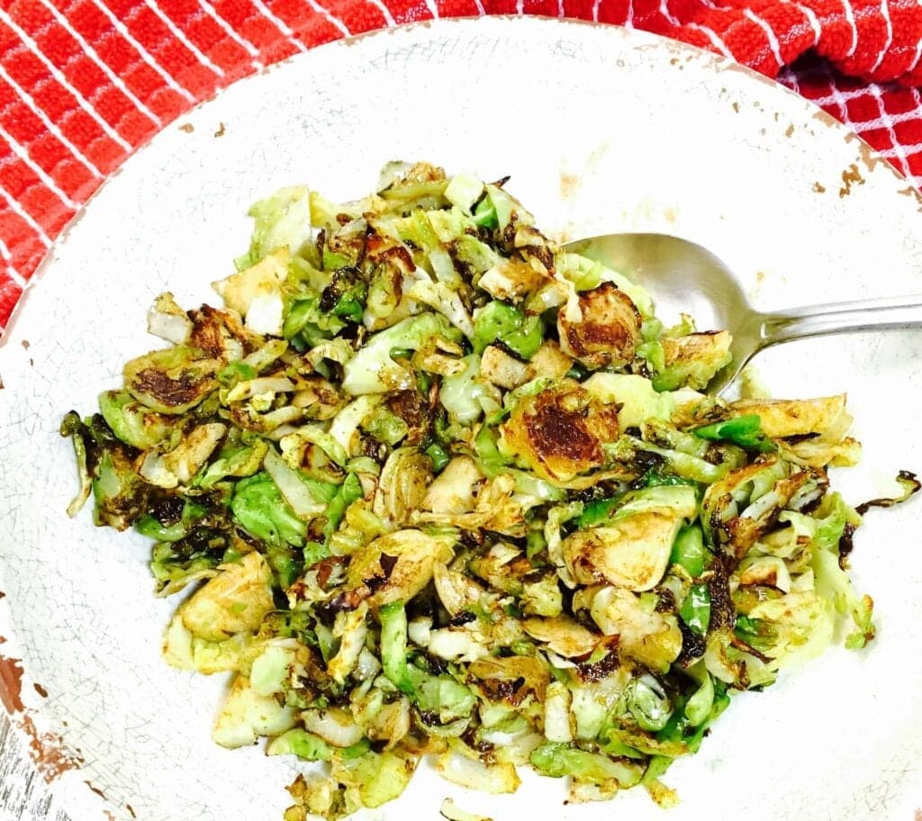 Shredded Brussels Sprouts on a white plate