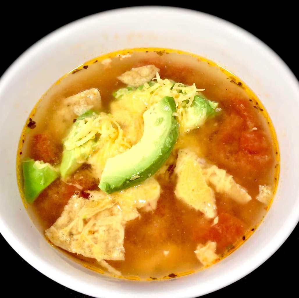 Bowl of Chicken Taco Soup in a white bowl