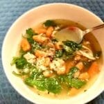 French Country Soup in a white bowl on a blue table cloth