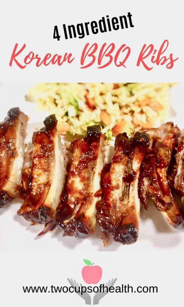 BBQ Ribs with coleslaw on a white plate.