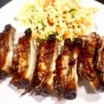 BBQ Ribs with coleslaw on a white plate