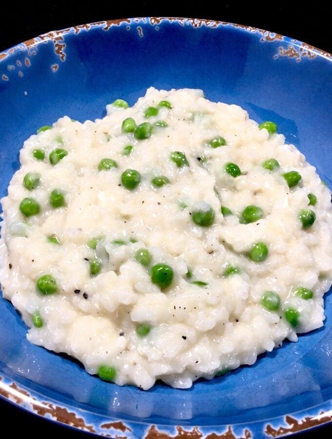 Risotto with Peas in a blue bowl
