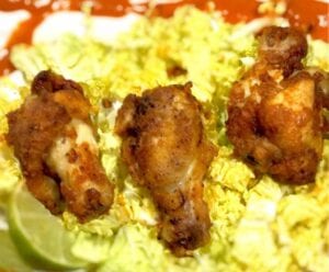 Chili Lime Wings on a bed of shredded cabbage