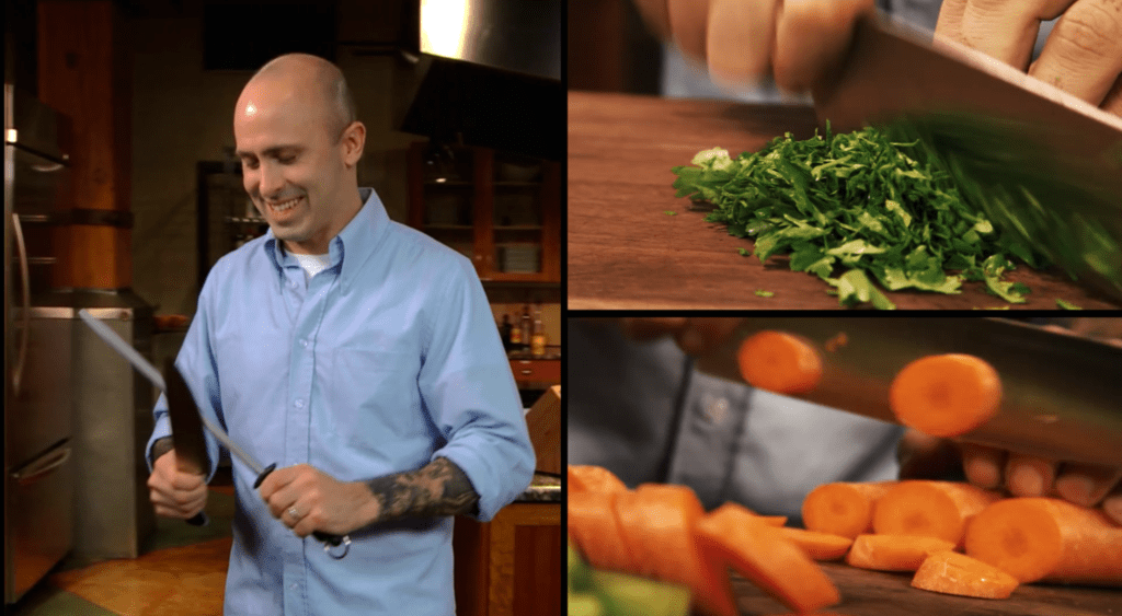 Chef Brand in a cooking class teaching knife skills