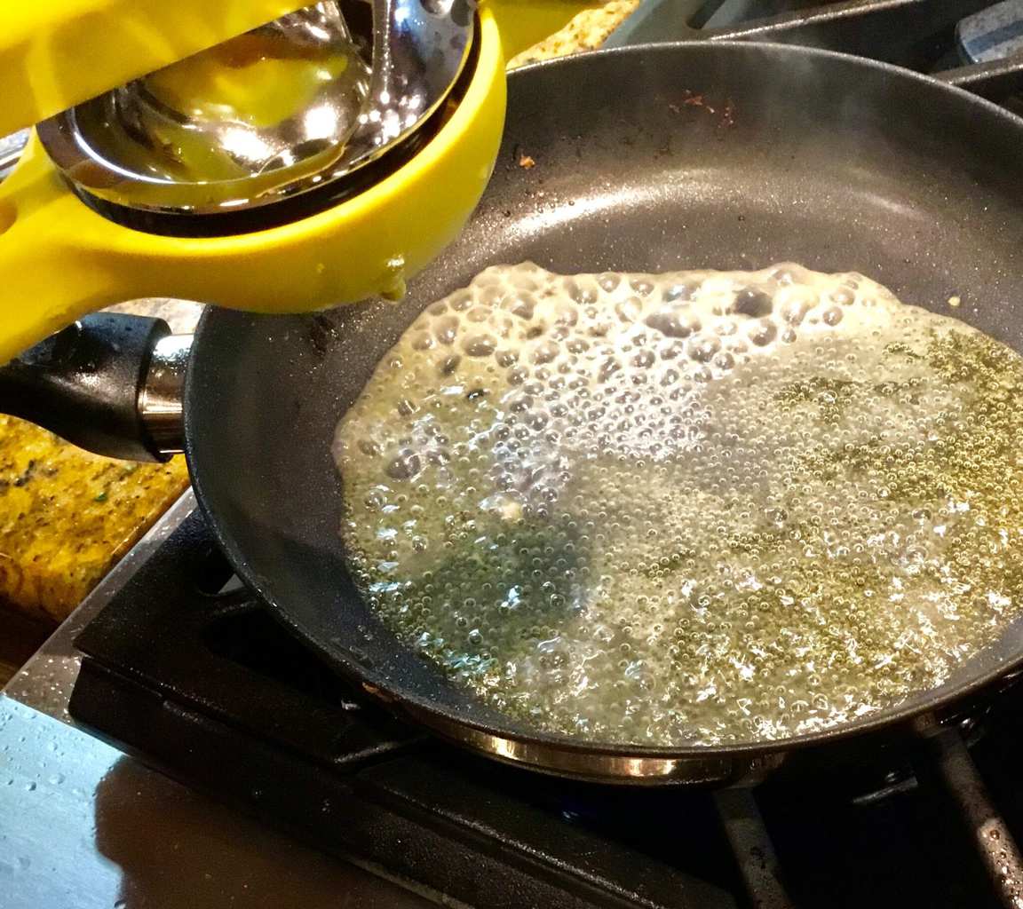 Butter sauce simmering with lemon juice