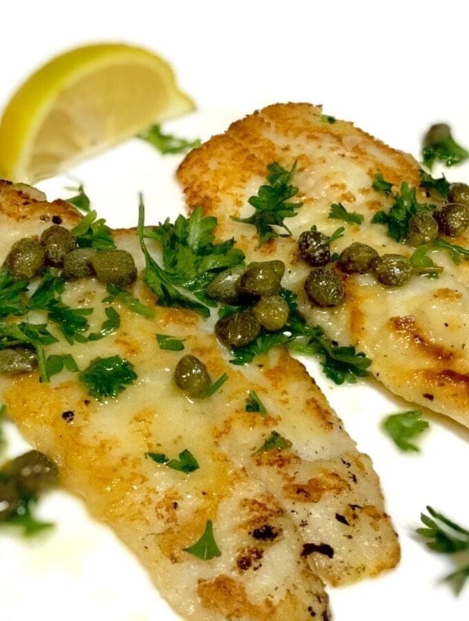 Dover Sole with Lemon and Capers on a white plate