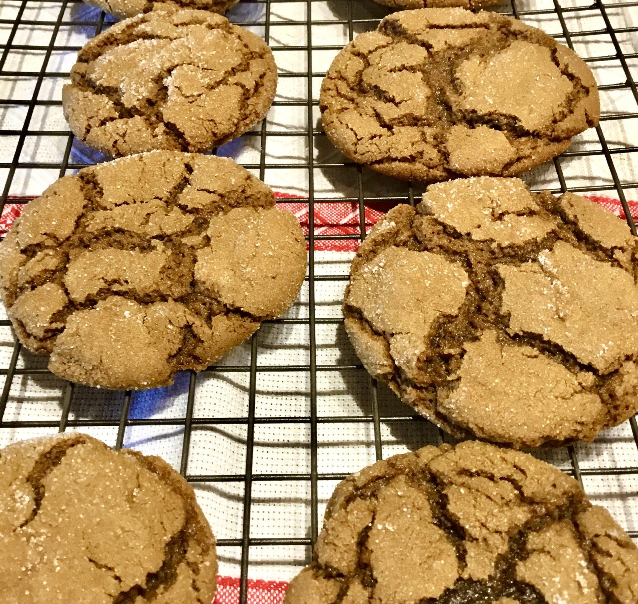 Molasses Ginger Cookies on a rack just out of the oven